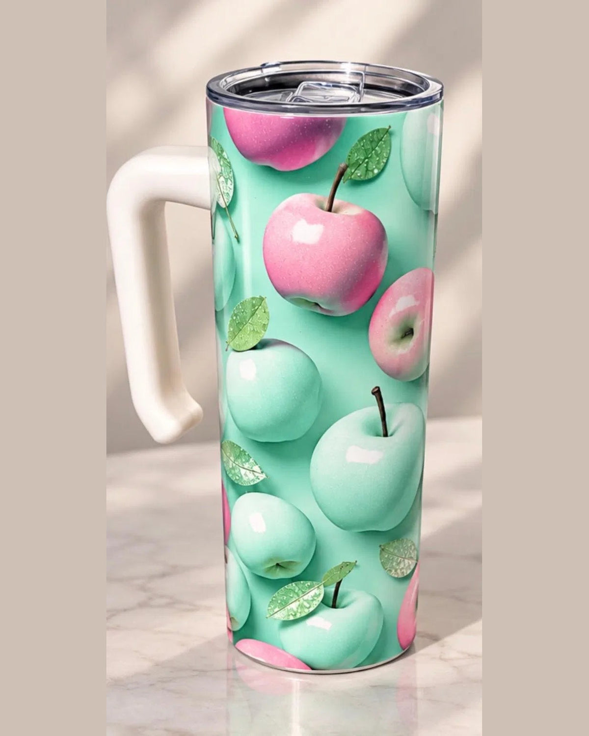Pink and Mint Apple 20 oz tumbler with handle, front view