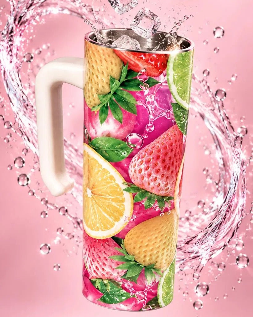 Strawberry Lemonade 20 oz tumbler with handle, pink splash background